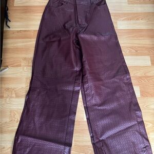 Brand new with tags… very dressy faux leather pants.